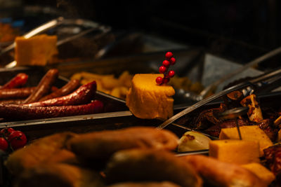 Close-up of meat on barbecue grill