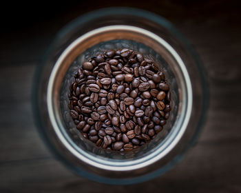 High angle view of coffee beans in glass