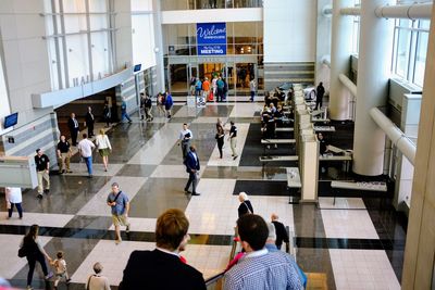 High angle view of people walking at airport