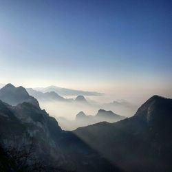 Scenic view of mountains during foggy weather