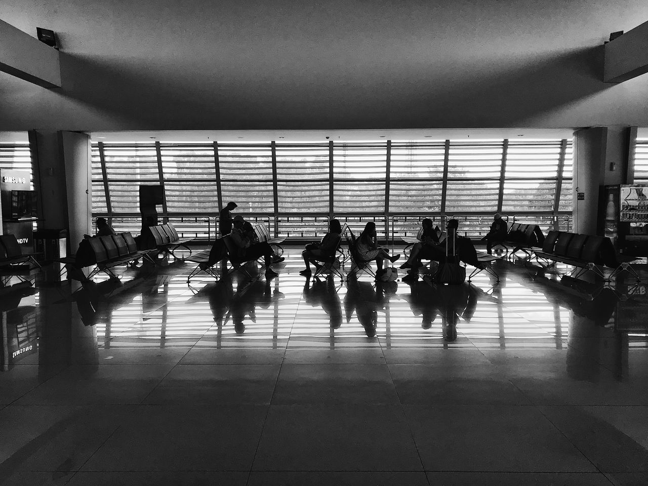 GROUP OF PEOPLE AT AIRPORT