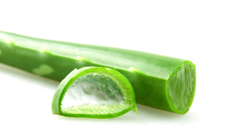 Close-up of green pepper against white background