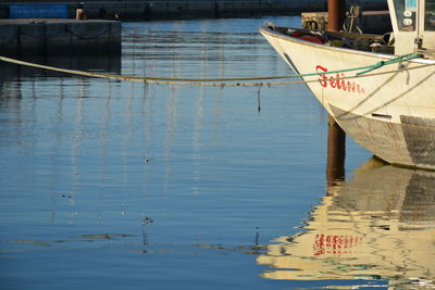 Fishing boat moored at harbor