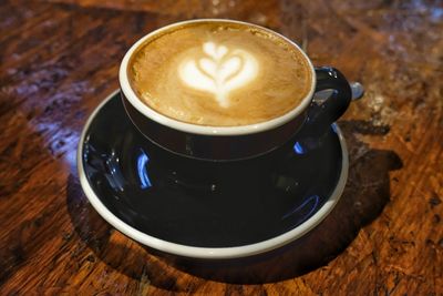 High angle view of cappuccino on table