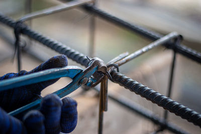 Close-up of rope tied to metal