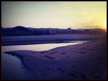 Scenic view of sea at sunset