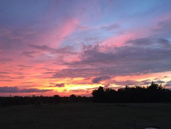 Silhouette of landscape against dramatic sky