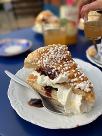 Close-up of ice cream served on table