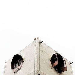 Low angle view of built structure against clear sky