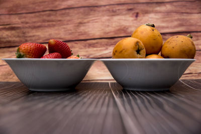 Close-up of strawberries in bowl on table