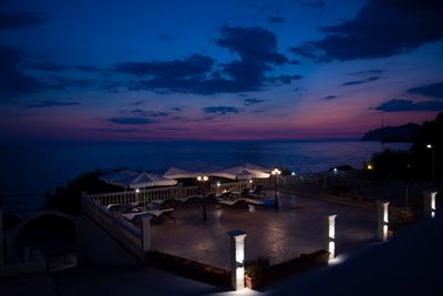 Scenic view of sea against sky at dusk