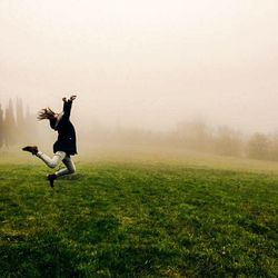 Man jumping on field