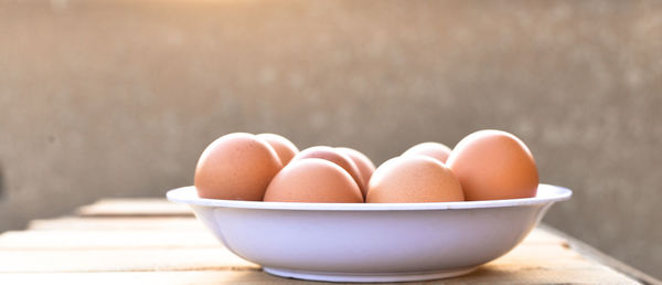 Close-up of eggs in bowl on table