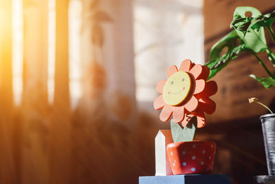 Close-up of small flowers on table