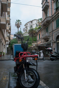 Cars parked on road in city