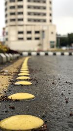 Surface level of road against buildings