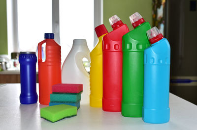 Close-up of multi colored bottles