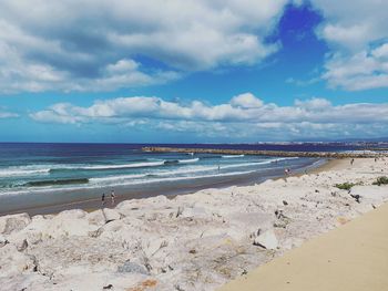 Scenic view of beach against sky