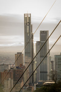 Modern cityscape against sky