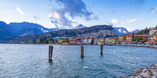 Panoramic view of townscape by sea against sky