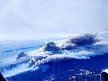 Aerial view of cloudscape over sea against sky