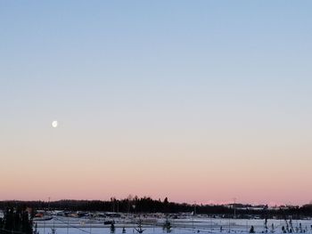 Scenic view of frozen lake against sky during winter