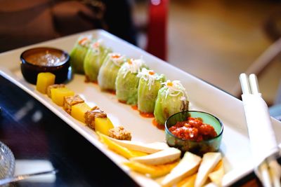 Close-up of food served on table