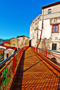 High angle view of bridge against clear blue sky