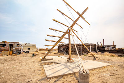 Construction site on field against sky