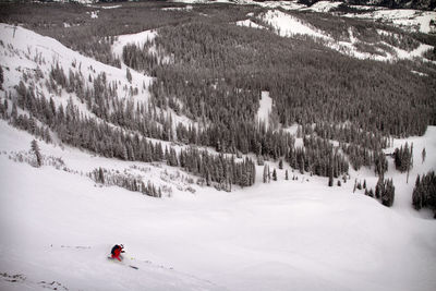 High angle view of man skiing on snow slope