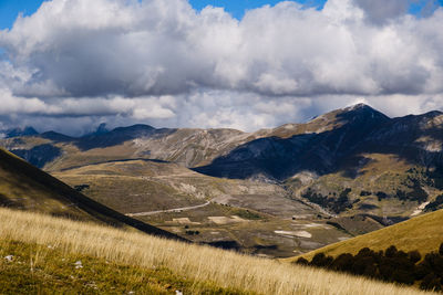 Scenic view of mountains against sky in castelluccio , umbria italy 