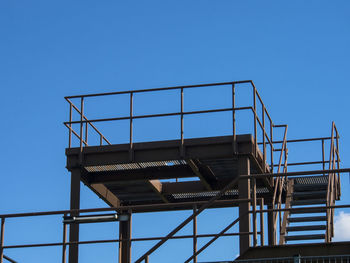 Low angle view of built structure against blue sky