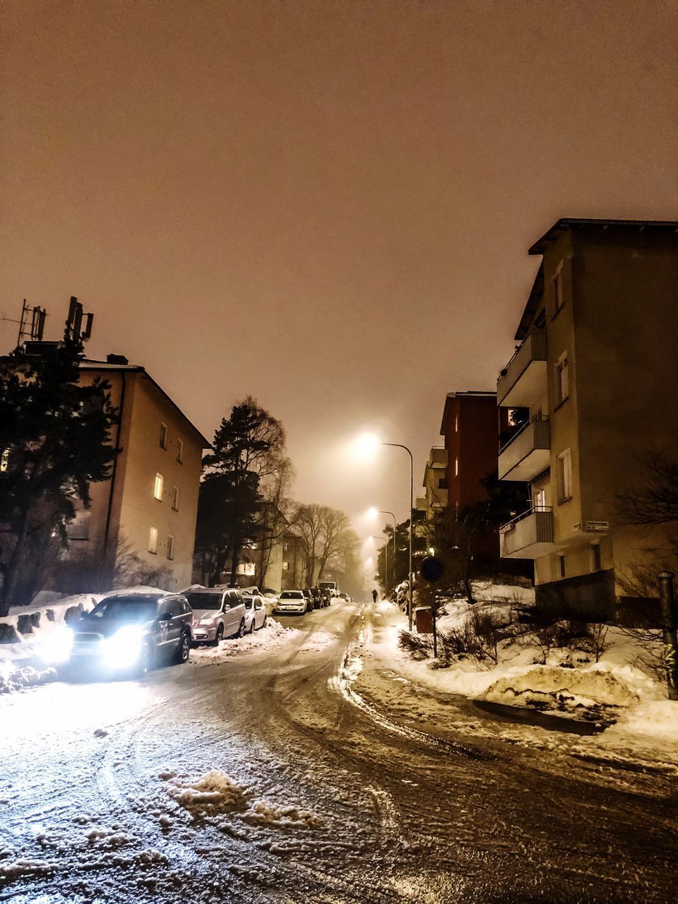 ROAD IN WINTER AT NIGHT