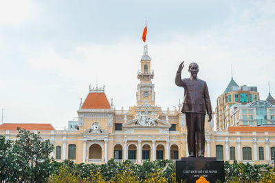 Statue of historic building against sky