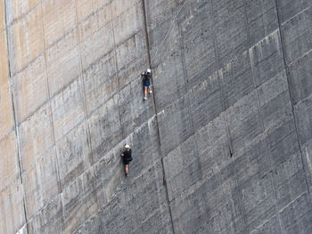 High angle view of people skiing on rope