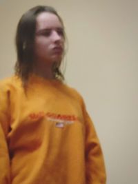 Portrait of young man against white background