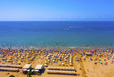 High angle view of beach against blue sky