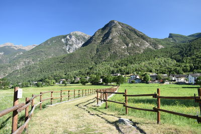 Scenic view of landscape and mountains against sky