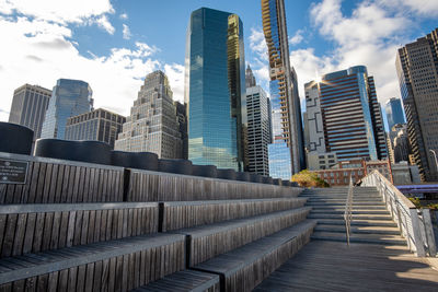 Modern buildings in city against sky