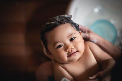 Portrait of cute baby at home