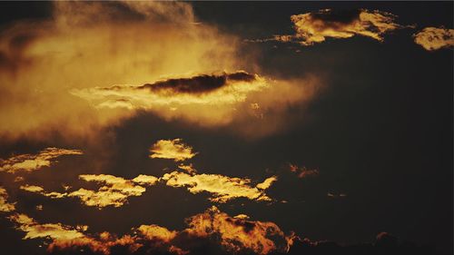 Low angle view of clouds in sky during sunset