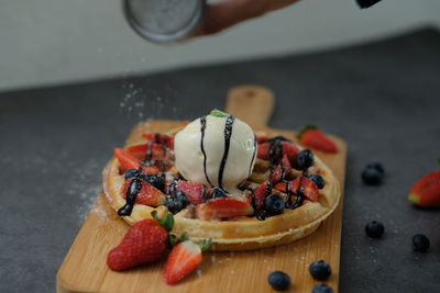 Close-up of chopped fruits on cutting board