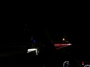 Light trails on road at night