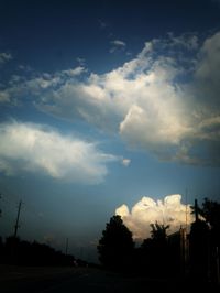 Scenic view of landscape against cloudy sky