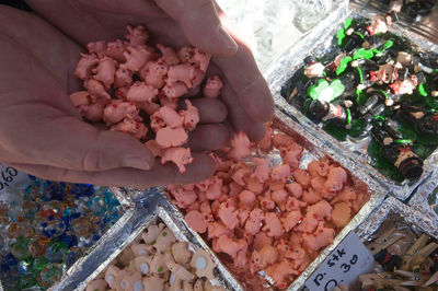 High angle view of hand holding food at market