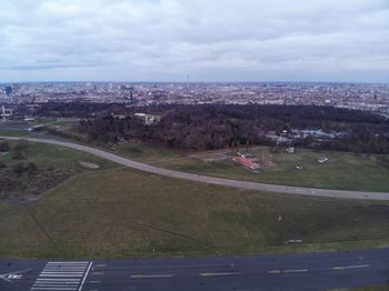 High angle view of city buildings against sky