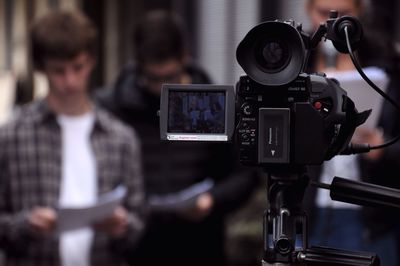 Man photographing in music concert