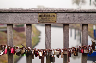 Close-up of padlocks on railing