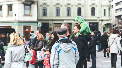 People standing on street in city