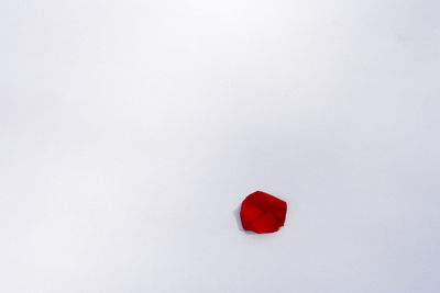 Close-up of heart shape over white background